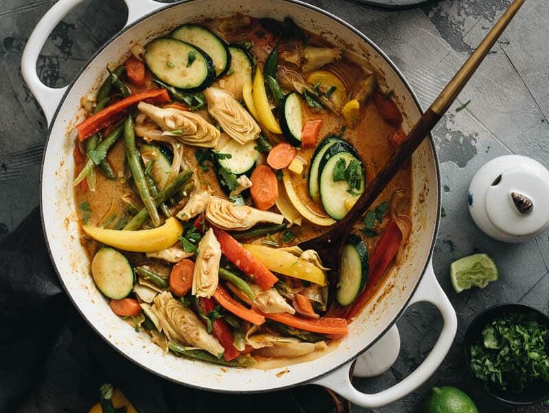 vegetarian thai curry in a white pot.