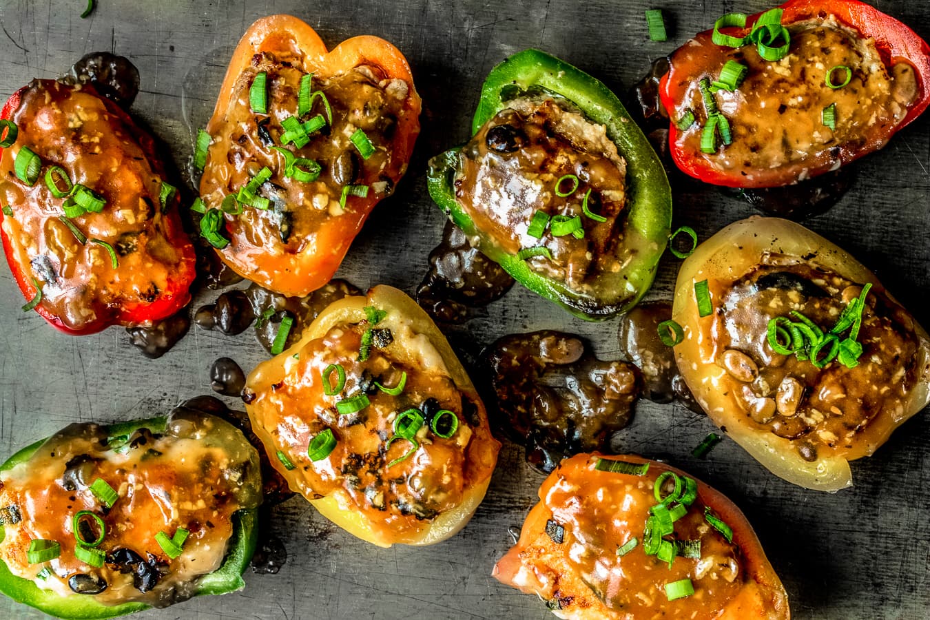 Chinese stuffed peppers (stuffed with shrimp) with black bean sauce on top.