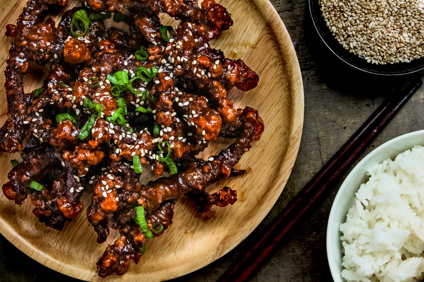 crispy beef on a wooden plate.