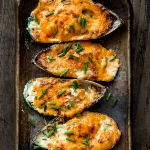 Close up of baked mussels with a creamy garlic cream cheese