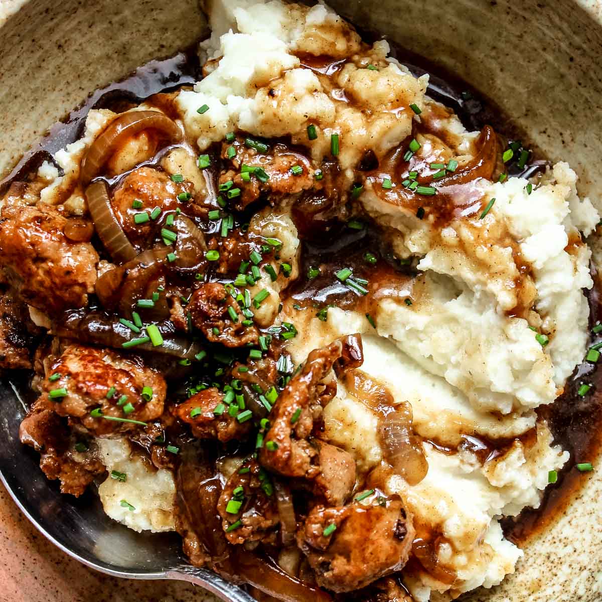 Bangers and Mash with Stout Onion Gravy