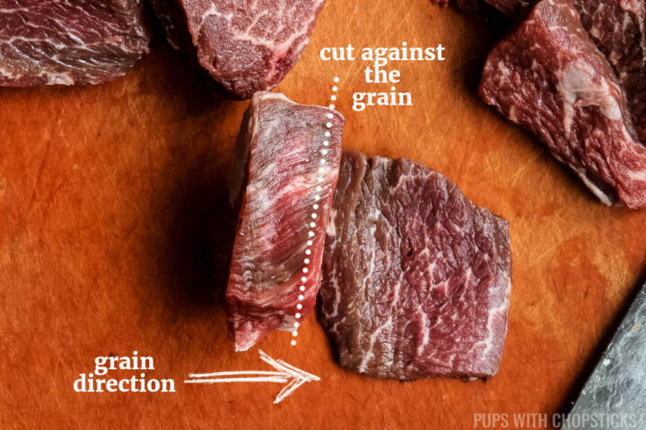 Showing how to cut beef against the grain.