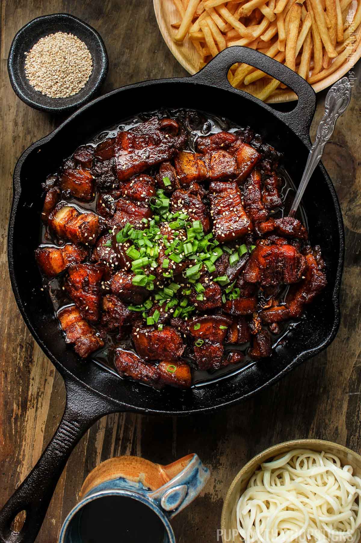 Chinese braised pork belly served in a cast iron pan