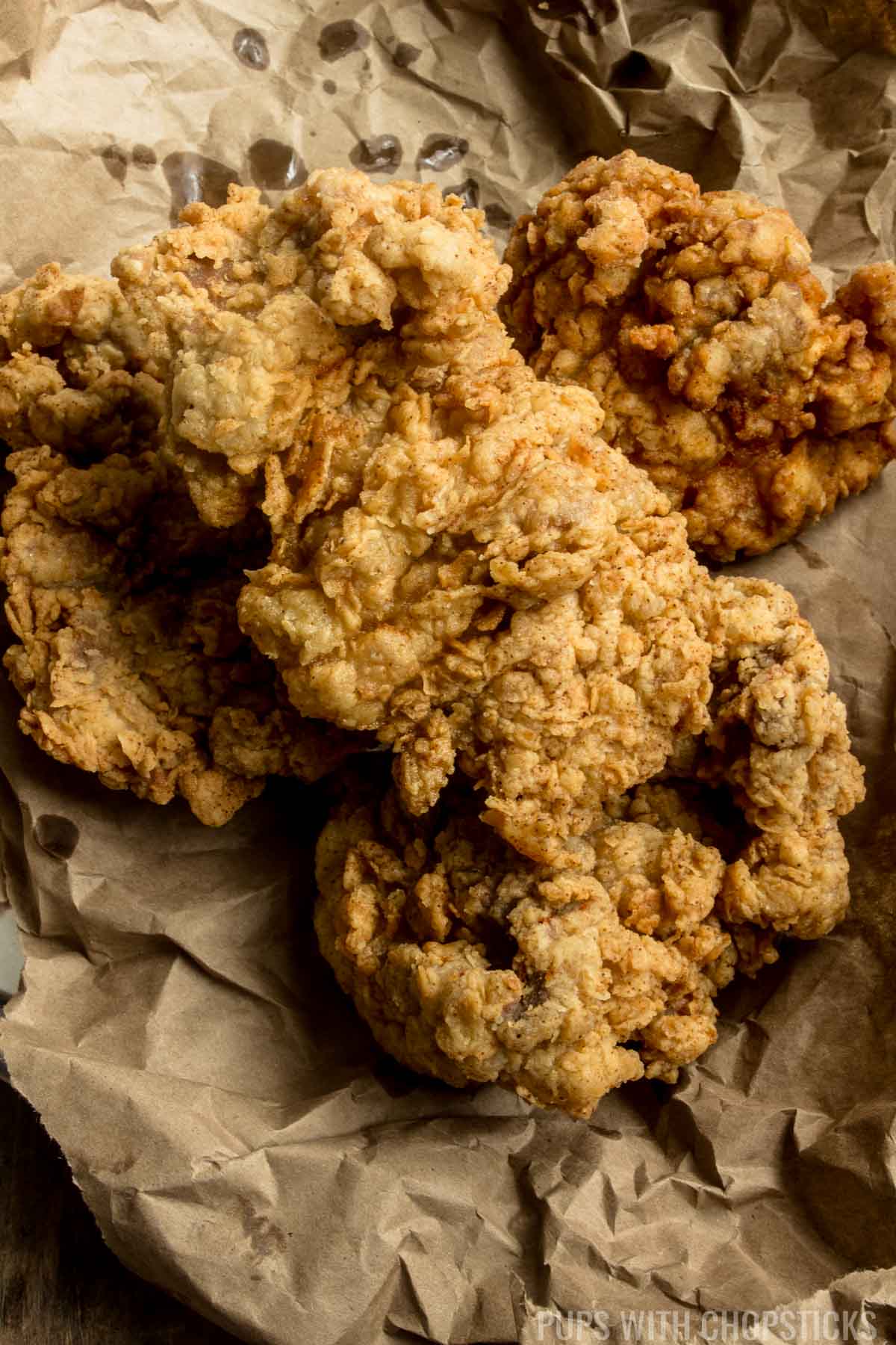 The Ultimate Super Crispy Fried Chicken Recipe that is super duper crispy, juicy and the batter never falls off the chicken so each bite is crispy to the end! 