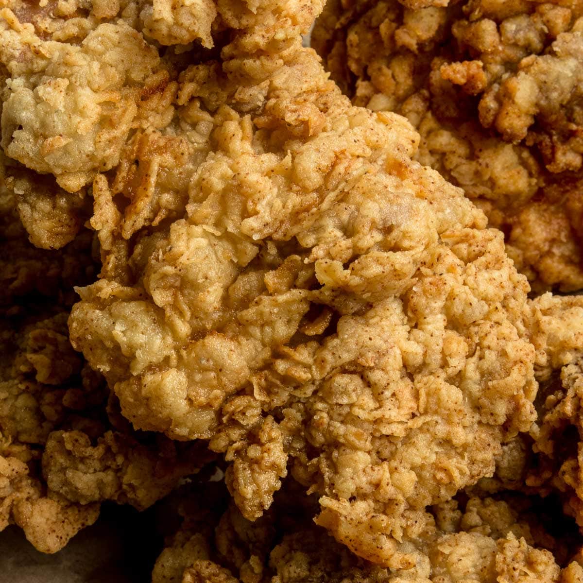 Closeup of crispy fried chicken.