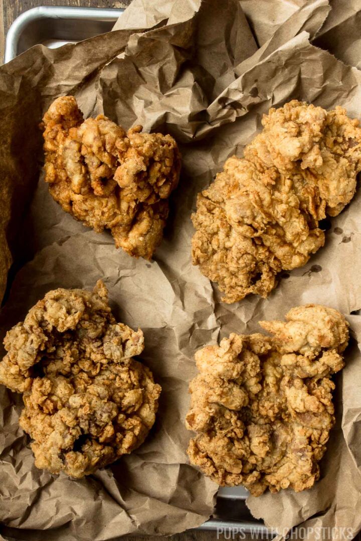 The Ultimate Super Crispy Fried Chicken Recipe that is super duper crispy, juicy and the batter never falls off the chicken so each bite is crispy to the end!