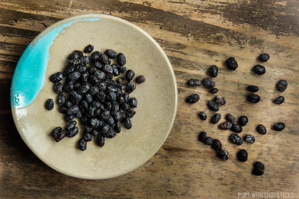 Dried fermented black beans on a plate 