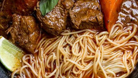 Closeup of Vietnamese bo kho stew in a black bowl