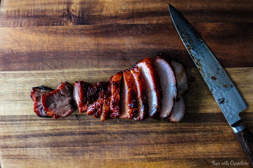 Char siu (Chinese BBQ Pork) thinly sliced with a sharp knife