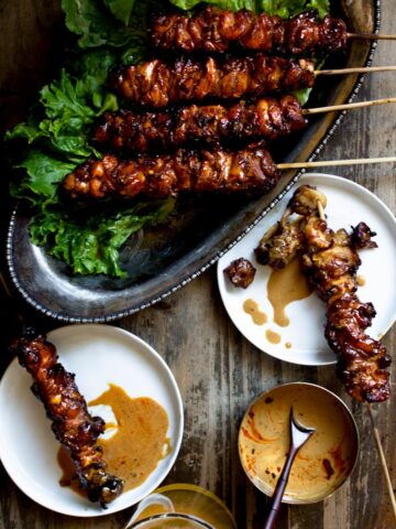 Grilled Chicken Skewers served with a peanut sauce