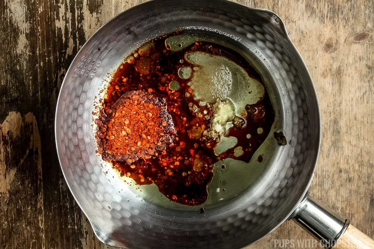 Making chili oil in a pot for chili oil noodles