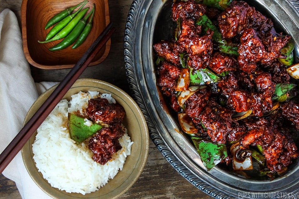 Hakka, Indian Chinese chilli chicken made with crispy chicken chunks and lightly tossed in a spicy chilli sauce.