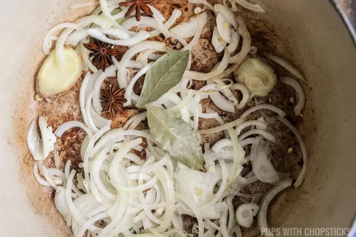 add onions and spices to the pot and brown.