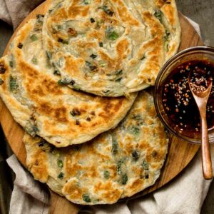 Scallion Pancakes laid out with dipping sauce
