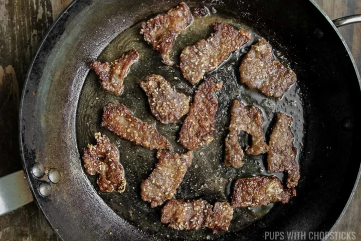 Pan frying beef slices for Chinese sesame beef.