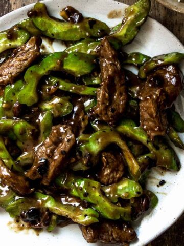 Traditional stir fried Chinese bitter melon recipe made with beef and a homemade black bean sauce