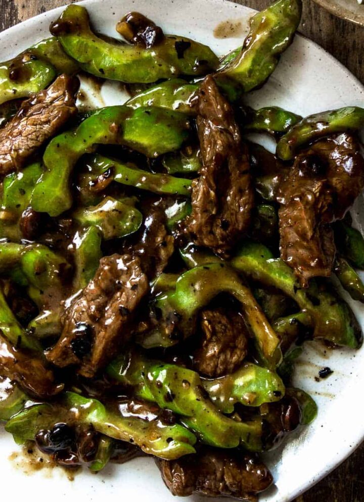 Traditional stir fried Chinese bitter melon recipe made with beef and a homemade black bean sauce