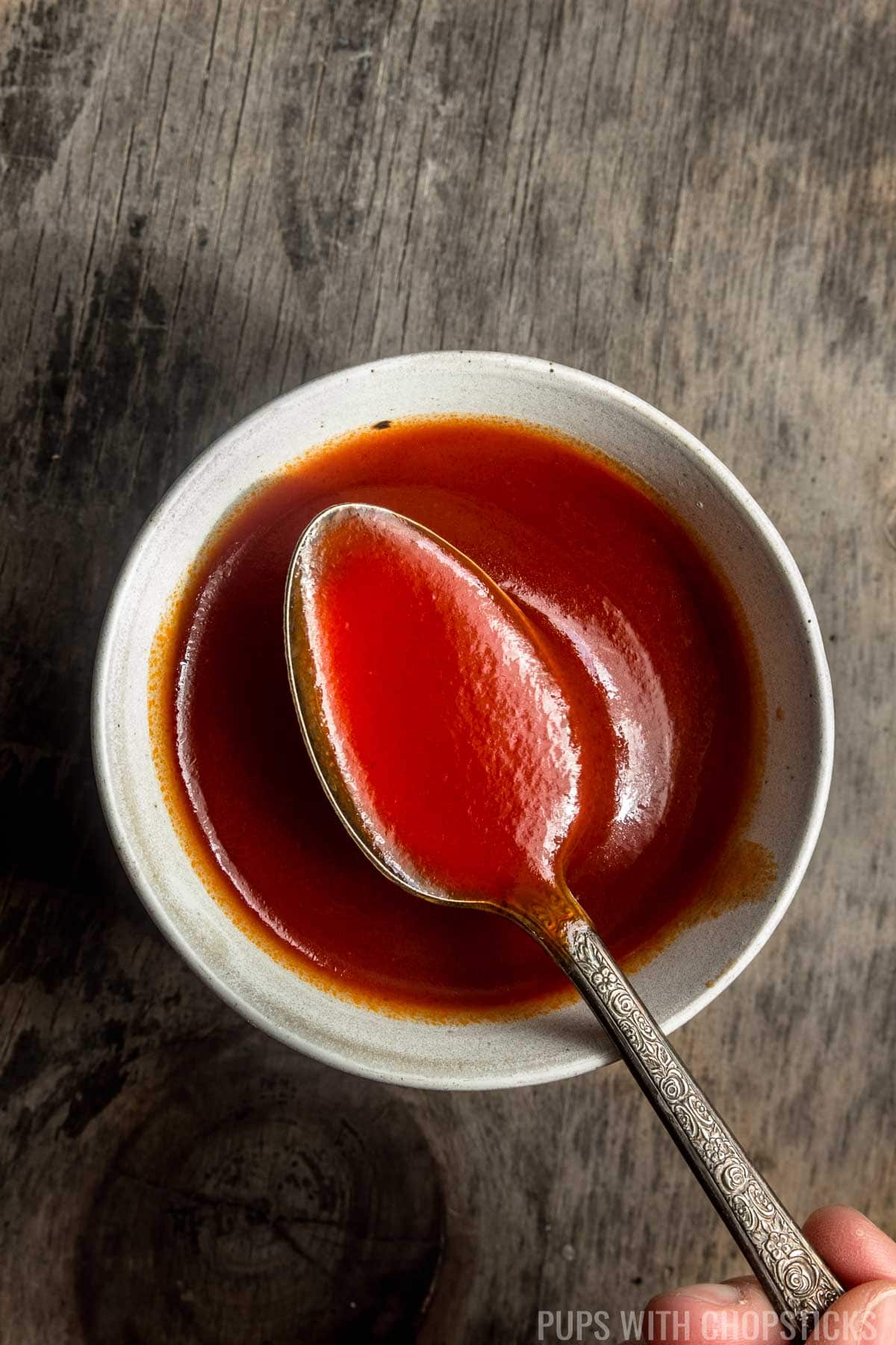 A small spoonful of Chinese sweet and sour sauce 