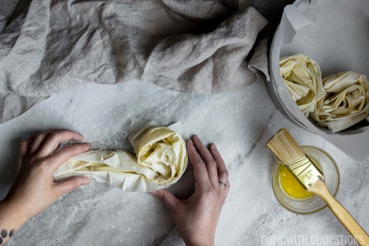 coiling the phyllo pastry into a spiral and tucking the end under.