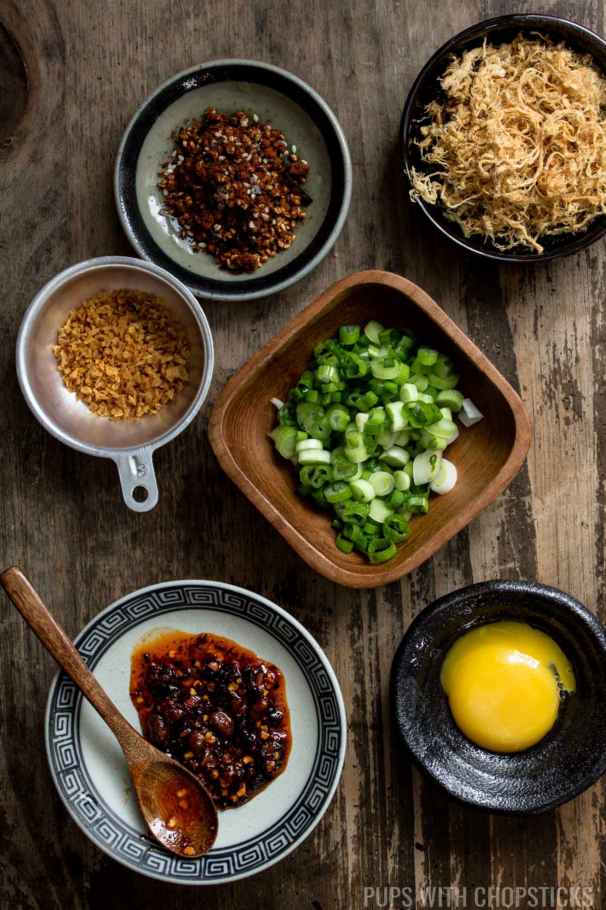 Toppings for Congee laid out on the table