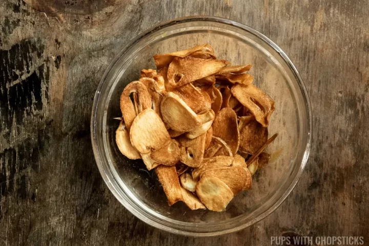 Garlic chips in a small glass bowl