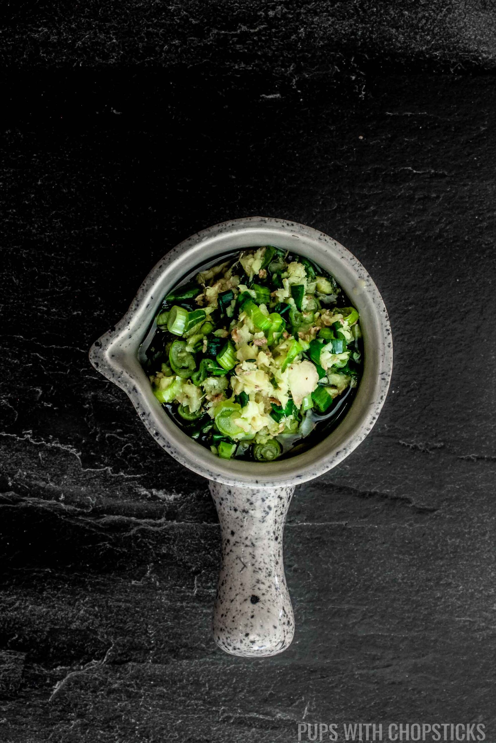 Ginger Scallion Sauce in a small bowl on a table