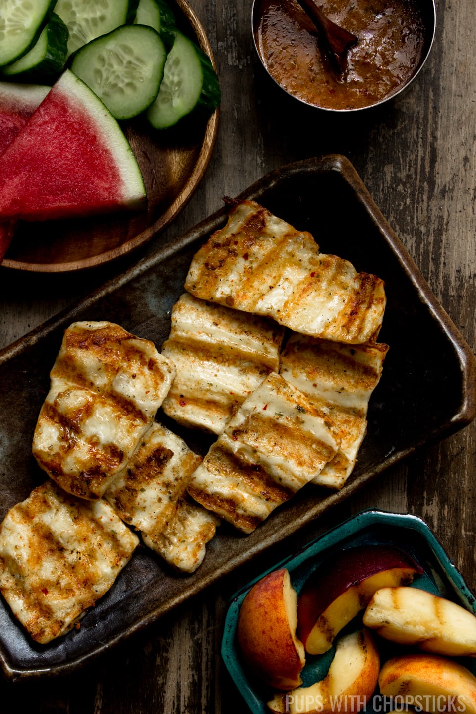 A grilled halloumi cheese recipe, marinated in a spiced basil chili oil and finished off with maple syrup