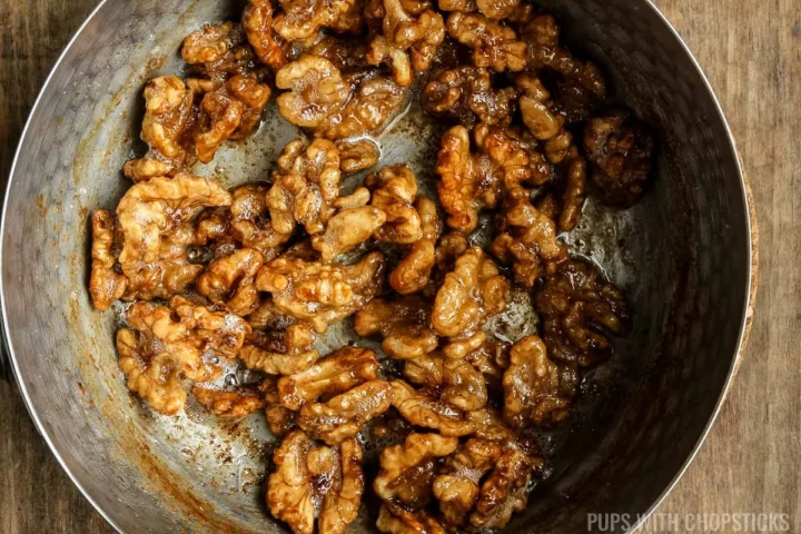 candied walnuts in a pot finished toasting.
