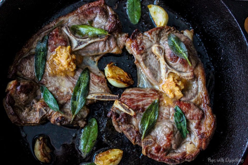 Pan Fried Lamb Chops with Miso Butter in a skillet