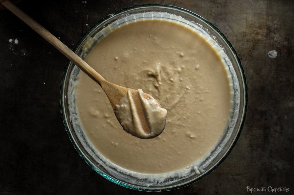 Mochi cake batter thickness tested on a wooden spoon