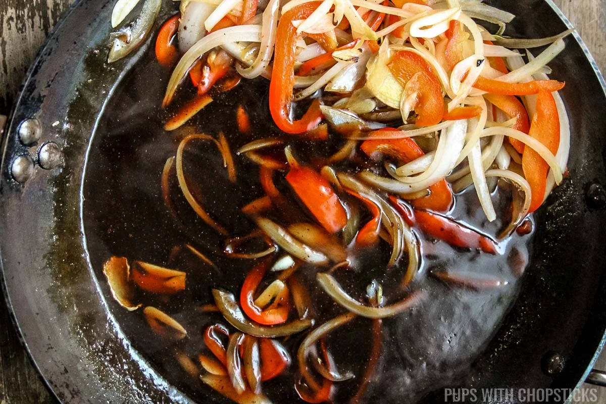 Mongolian beef sauce thickening in frying pan