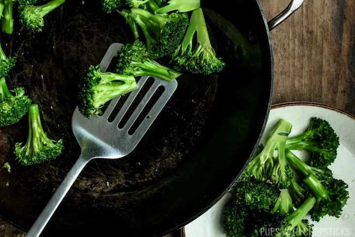 Remove steamed broccoli out of the pan.