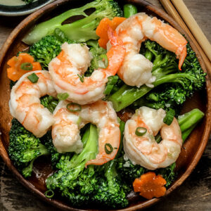 Thumbnail of shrimp and broccoli in a wooden bowl.