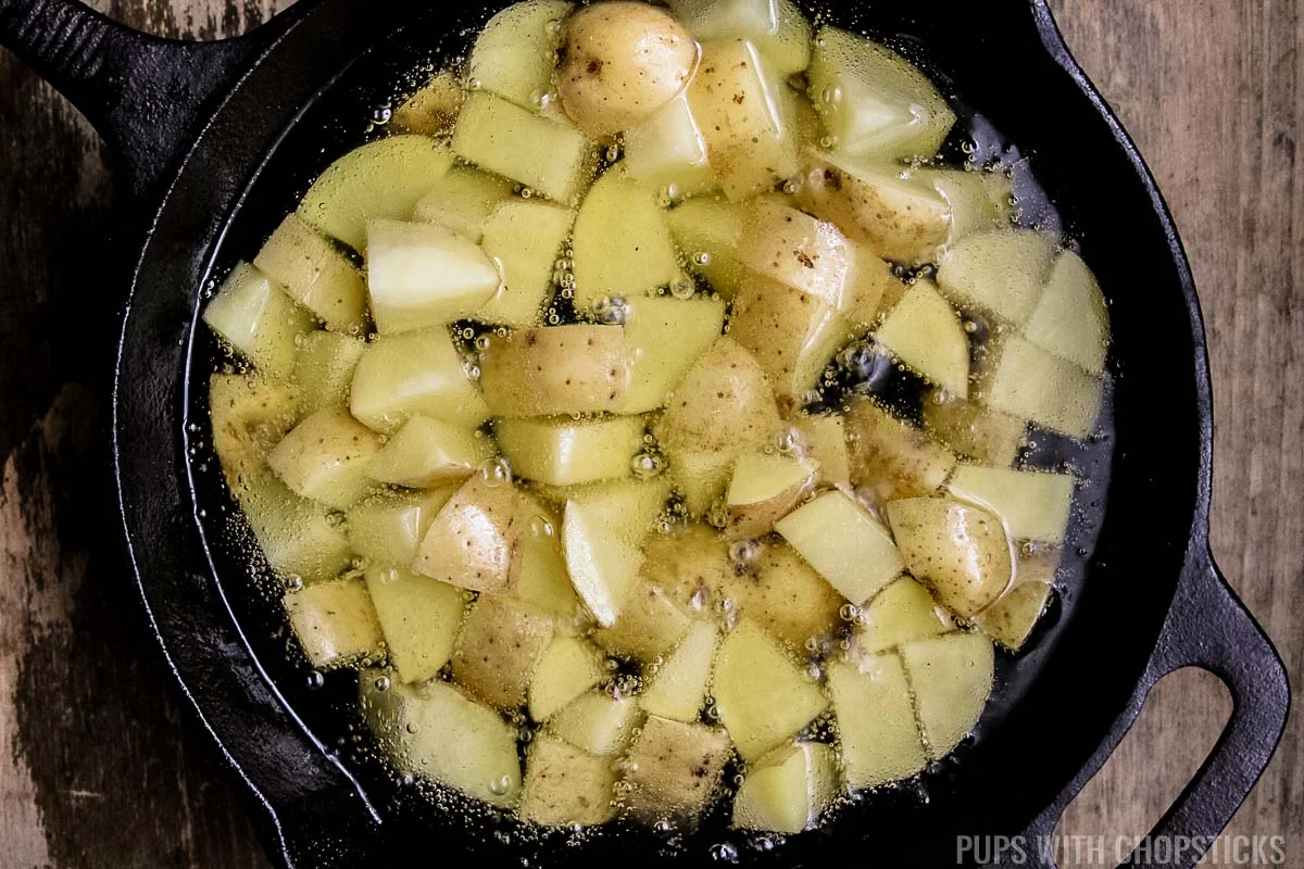 https://pupswithchopsticks.com/wp-content/uploads/skillet-potatoes-with-onions-fry-potatoes.webp
