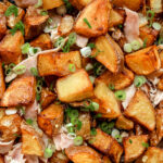 Closeup of skillet potatoes with onions