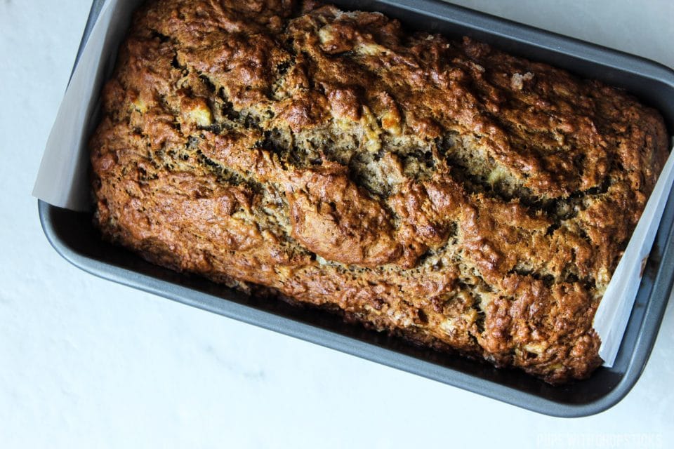 Moist banana bread, fresh out of the oven in a loaf pan