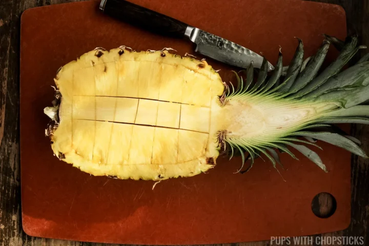 cut a 3x6 grid in the pineapple.