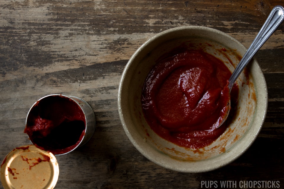 Homemade Ketchup made with tomato paste in a small bowl for Chinese Tomato and Egg Stir Fry