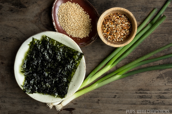 Ingredients of topping ideas for tuna mayo (roasted seaweed snacks, sesame seeds, green onions, furikake)