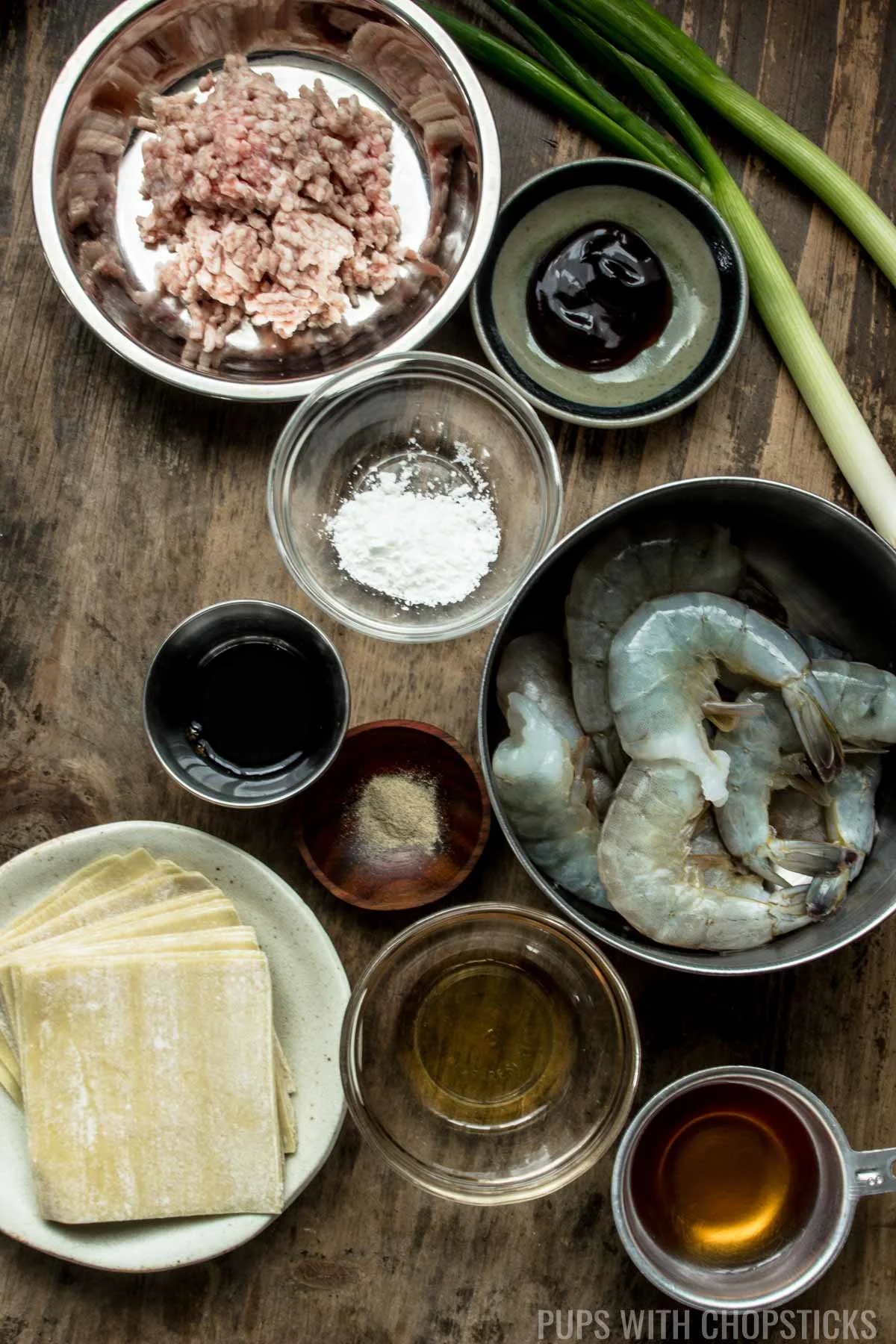 Ingredients for wonton dumplings (ground pork, shrimp, green onions, oyster sauce, fish sauce, corn starch, sesame oil, wonton wrappers)
